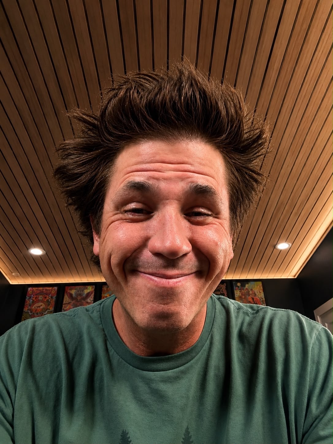 Playful close-up portrait of Will Phillips without a hat